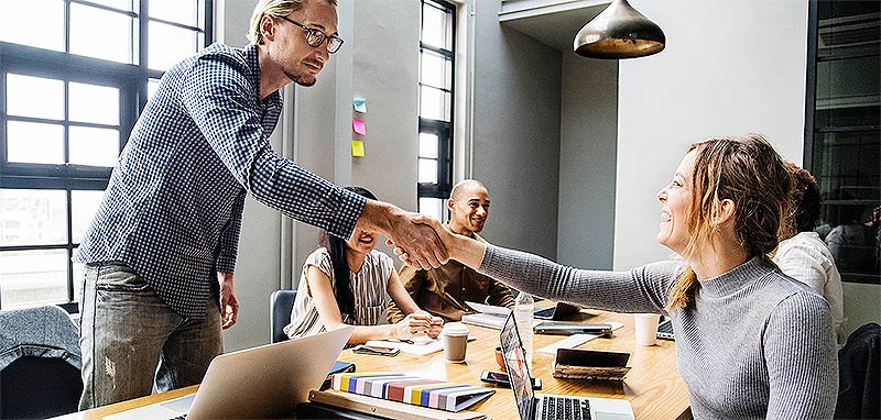 co-workers meeting over google analytics audit results