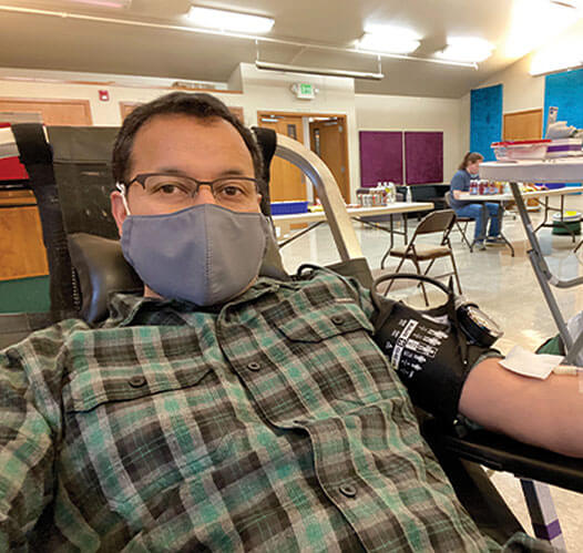 Matthew Carmean donating blood