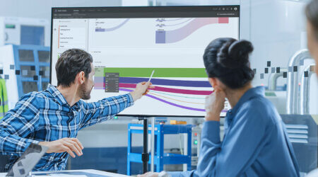 teammates looking at a/b testing dashboards