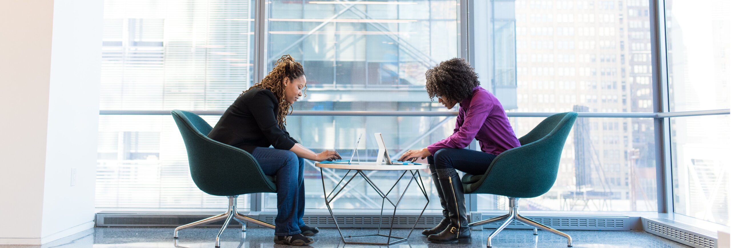 business woman discussing next steps for their facebook campaigns