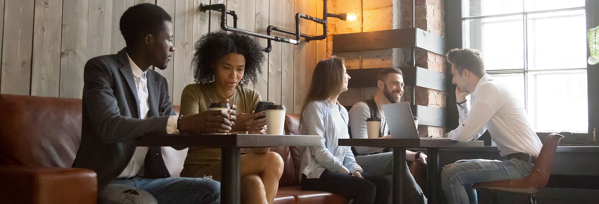 business professionals sitting in a coffee shop